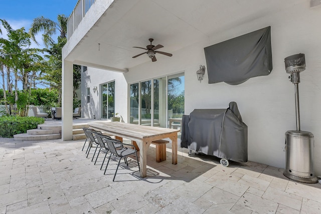 view of patio / terrace with grilling area and ceiling fan