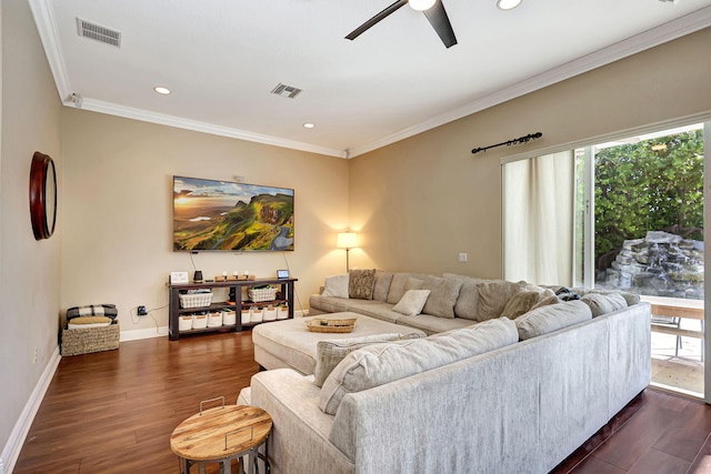 living room with dark wood-type flooring, ceiling fan, and ornamental molding