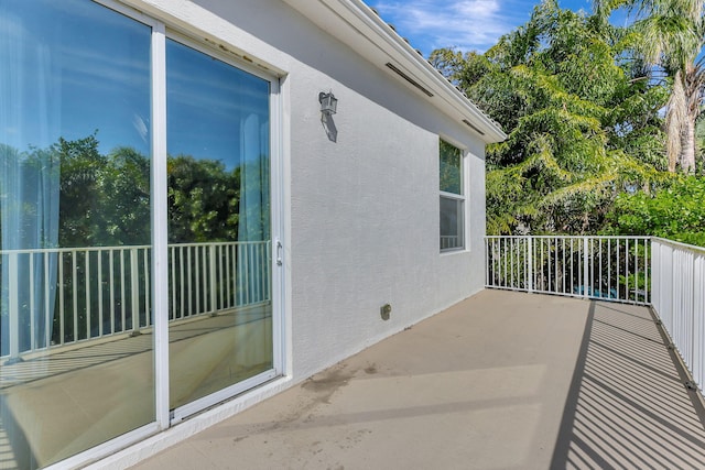 view of patio with a balcony