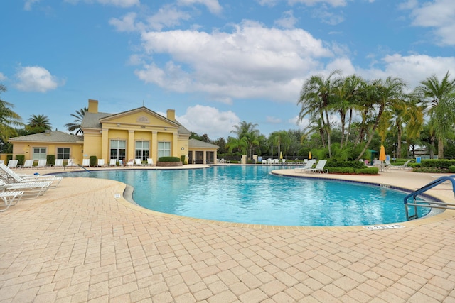 view of swimming pool featuring a patio