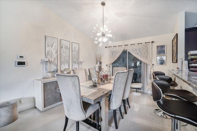 dining room with an inviting chandelier, lofted ceiling, and light tile patterned floors