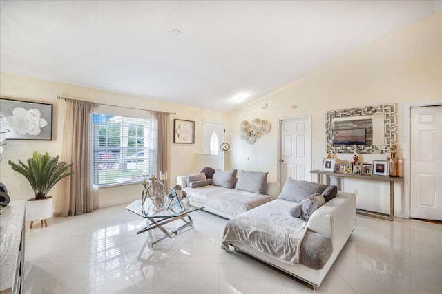 living room featuring light tile patterned flooring and lofted ceiling