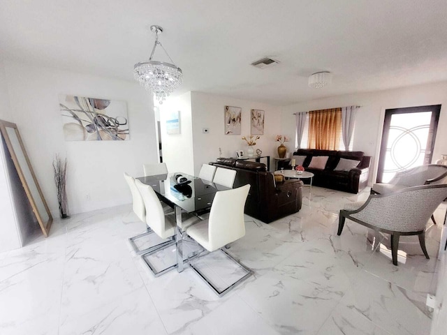 dining room with a chandelier