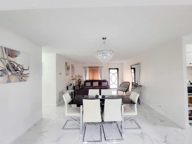 dining room featuring a chandelier