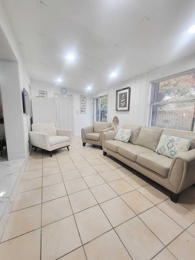 living room with light tile patterned floors