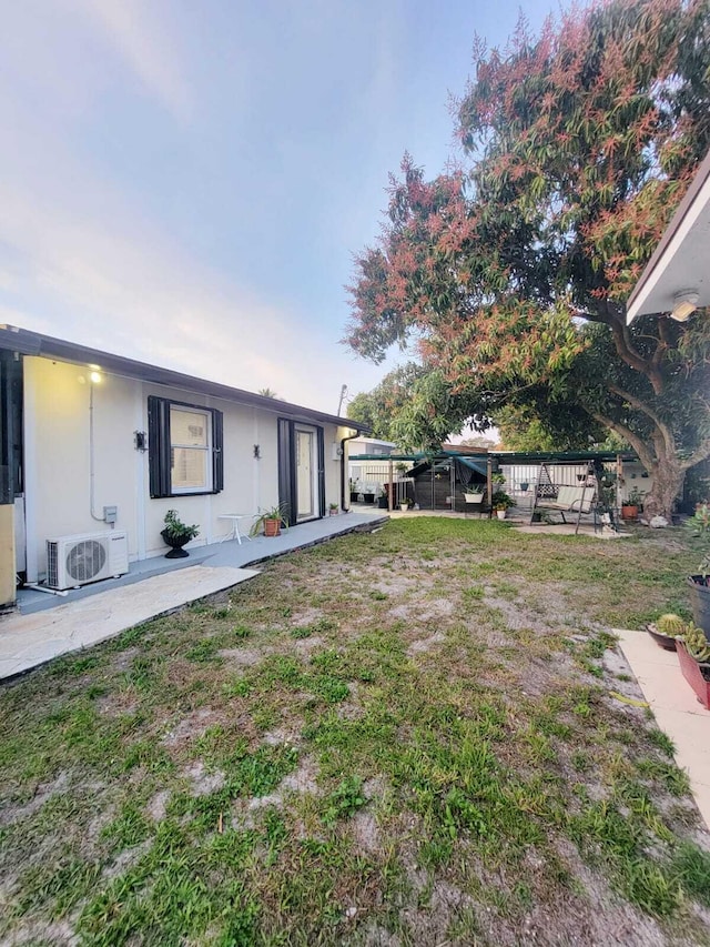 exterior space featuring ac unit