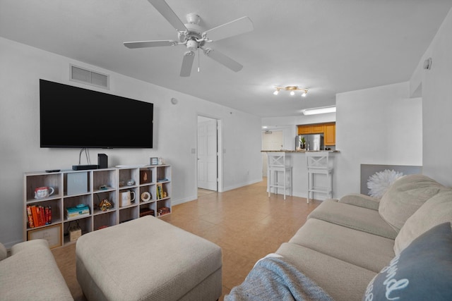 living room with ceiling fan