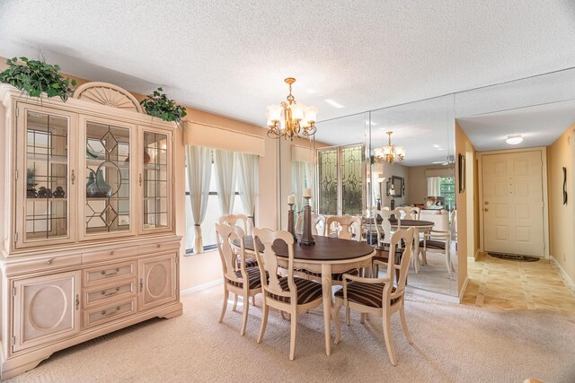 living room featuring a textured ceiling, carpet flooring, and ceiling fan