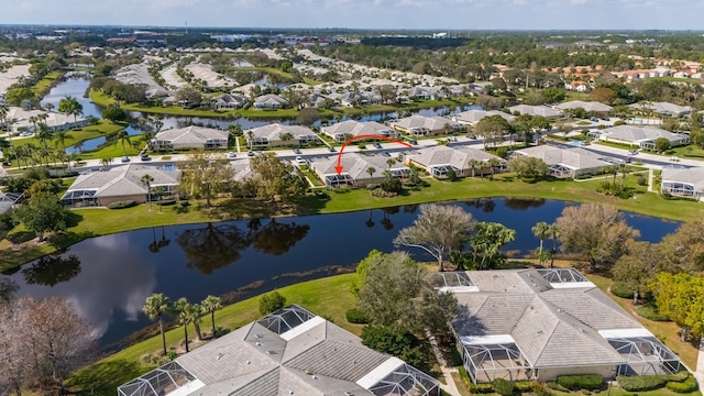 bird's eye view with a water view