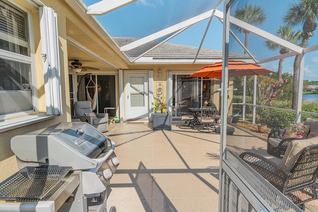 view of patio / terrace with a lanai