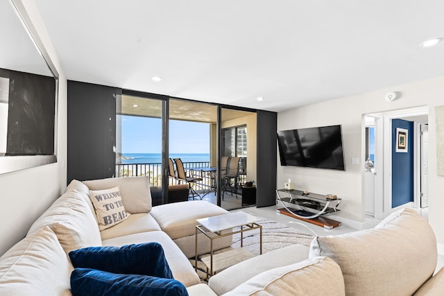 living room with a wall of windows