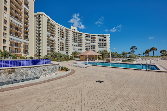 view of pool with a gazebo and a patio