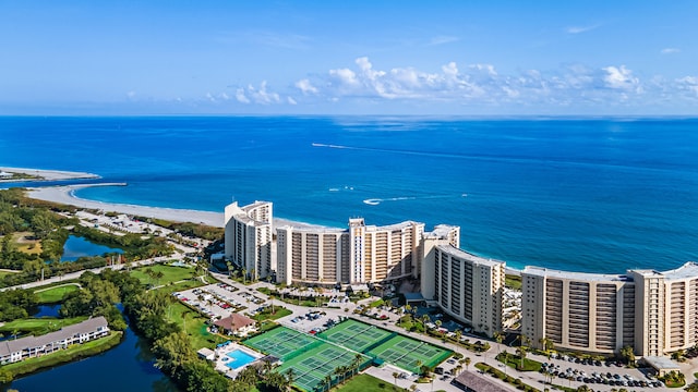 drone / aerial view with a view of the beach and a water view