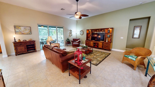 tiled living room featuring ceiling fan