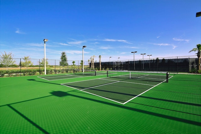 view of sport court featuring basketball hoop