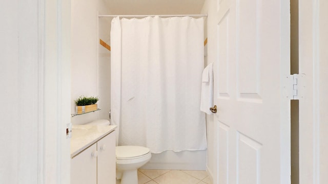 full bathroom with toilet, shower / bath combination with curtain, vanity, and tile patterned flooring