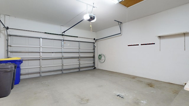 garage featuring a garage door opener