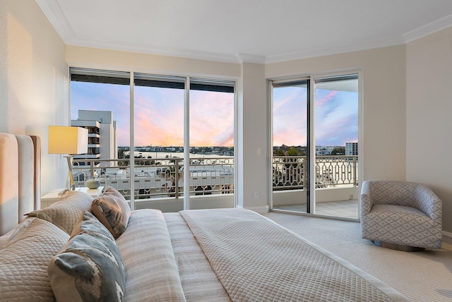 bedroom with ornamental molding, carpet flooring, and access to outside