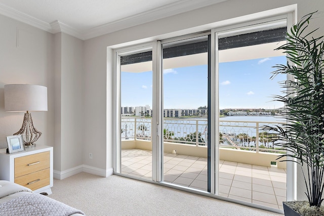 bedroom with light carpet, ornamental molding, and a water view