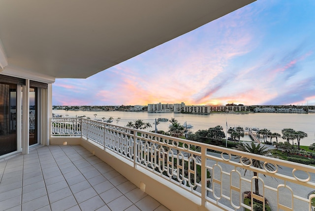 balcony at dusk with a water view