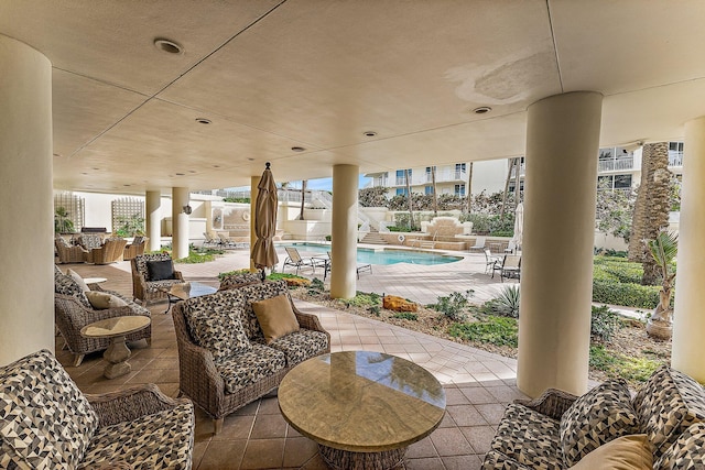 view of patio / terrace featuring a fenced in pool