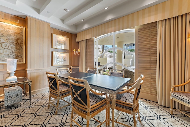 dining room featuring beamed ceiling