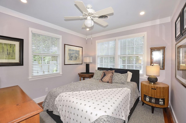 bedroom with ceiling fan, recessed lighting, wood finished floors, and baseboards