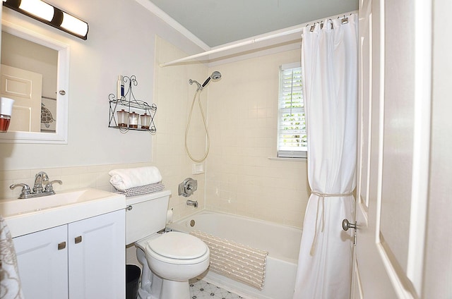 full bathroom featuring shower / tub combo, crown molding, vanity, and toilet