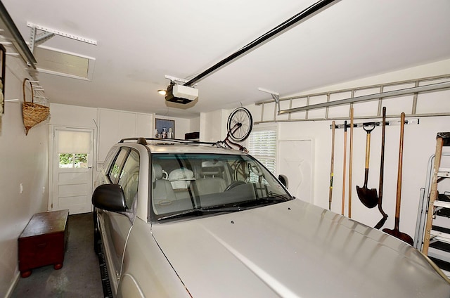 garage featuring a garage door opener