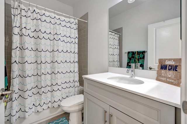 full bathroom featuring vanity, shower / bathtub combination with curtain, and toilet