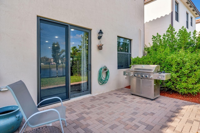 view of patio featuring a grill