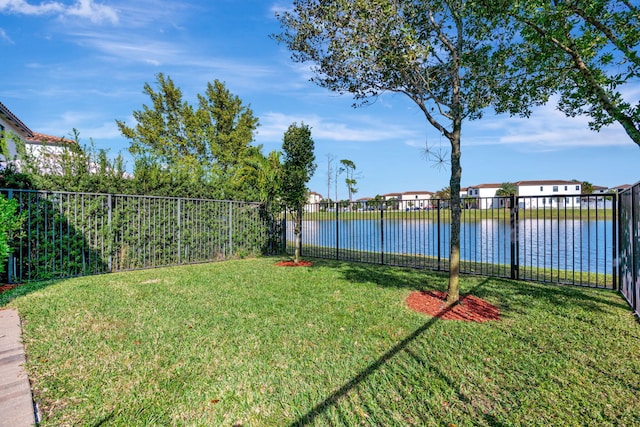 view of yard with a water view