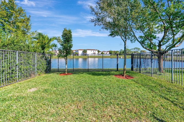 view of yard with a water view