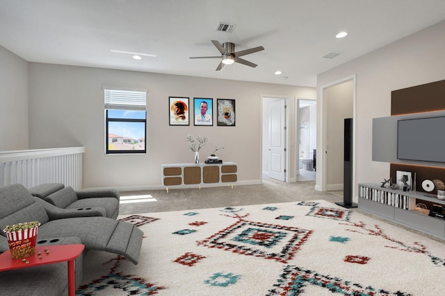 living room with light carpet and ceiling fan