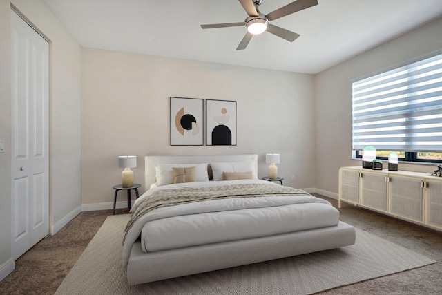 carpeted bedroom featuring ceiling fan