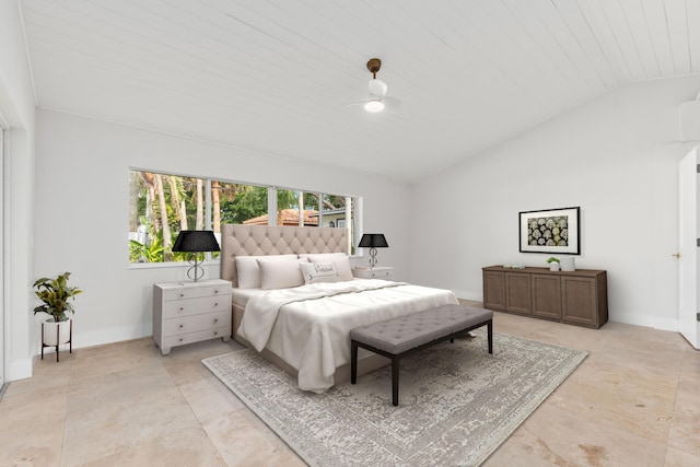 bedroom with baseboards, a ceiling fan, and lofted ceiling