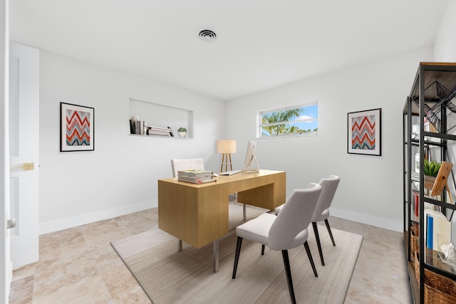 office area with baseboards and visible vents