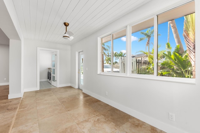 4430 SE Bayshore Ter, Stuart, FL 34997 - entryway with independent washer and dryer and baseboards