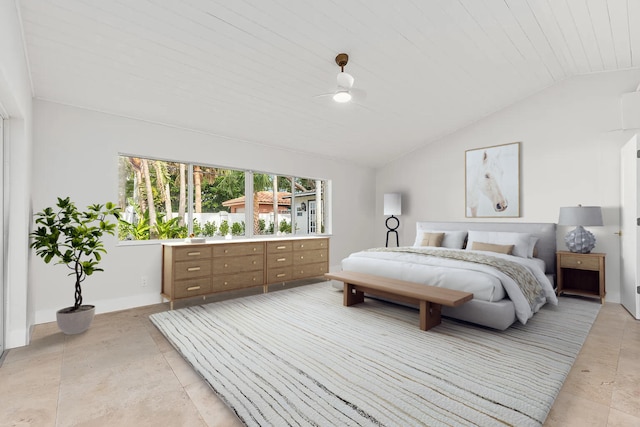 4430 SE Bayshore Ter, Stuart, FL 34997 - bedroom featuring vaulted ceiling, a ceiling fan, and light tile patterned floors