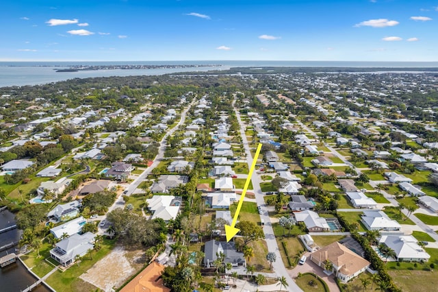 aerial view featuring a water view and a residential view