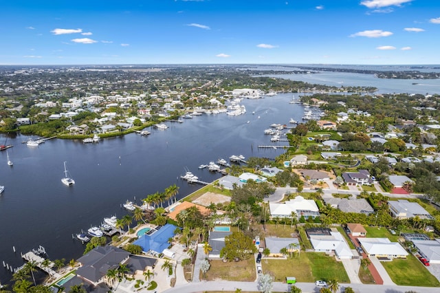 aerial view with a water view and a residential view