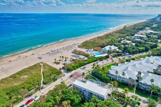 aerial view with a view of the beach and a water view