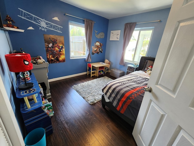 bedroom featuring dark hardwood / wood-style flooring