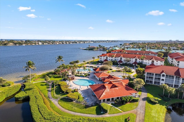 drone / aerial view with a water view