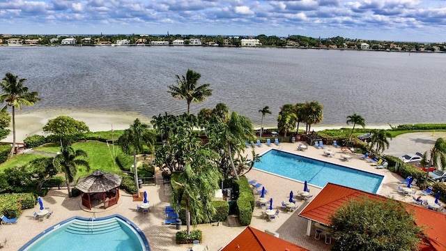 drone / aerial view with a water view