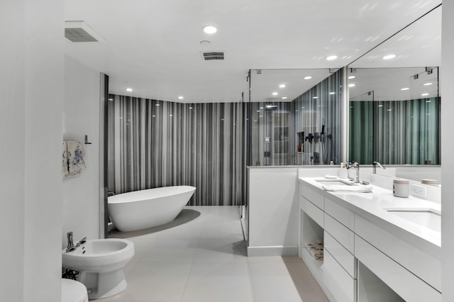 bathroom with vanity, tile patterned floors, a bidet, and separate shower and tub