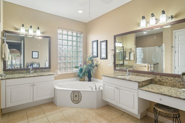 bathroom with vanity, independent shower and bath, and tile patterned flooring