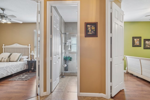 bedroom with light wood-type flooring