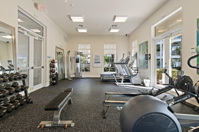 gym with french doors