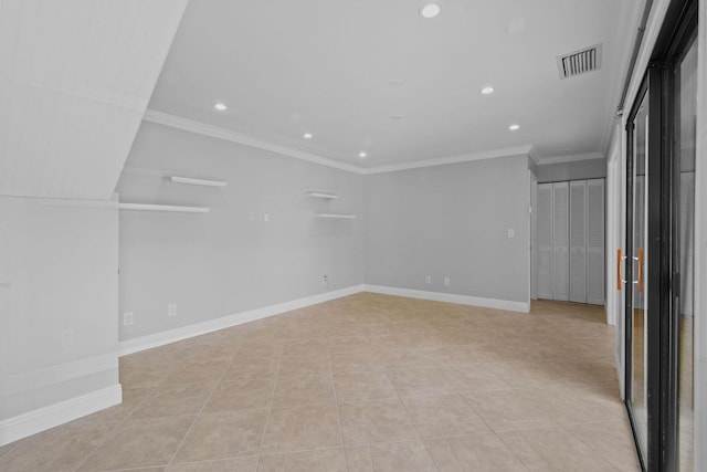 tiled empty room with crown molding